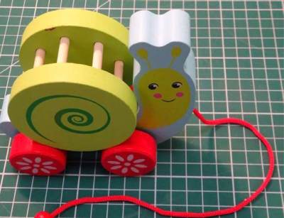 Photo of OkOk Animal Drag Snail Pull Along Toy