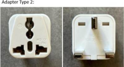 Photo of White UK Plug Adapters supplied with certain Electric Pumps used for AirTumble Gymnastic Tracks
