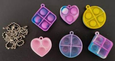 Photo of Pop Bubble Fidget Toy Keyrings sold via Amazon