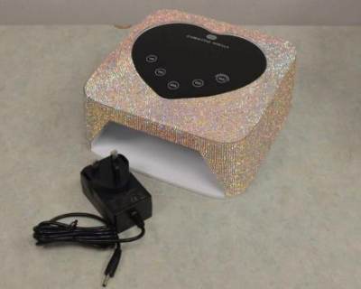 Photo of Adaptor supplied with Christine Shelly Cordless UV LED Nail Lamp