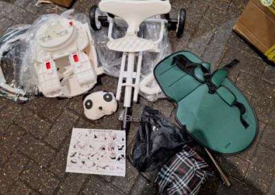 Photo of White and Green Stroller