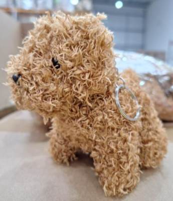 Photo of Haconba Mini Dog Plush Toy sold via Amazon