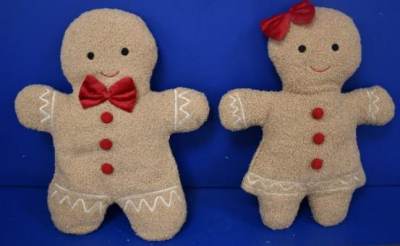 Photo of Gingerbread Shaped Cushions sold by The Range and Wilko