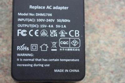 Photo of 65W AC Adaptor, DHM1706 sold via Amazon