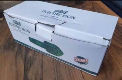Photo of Mini Ironing Machine sold via Amazon