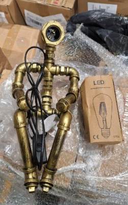 Photo of Plumbing Effect Sitting Person Portable Lamp