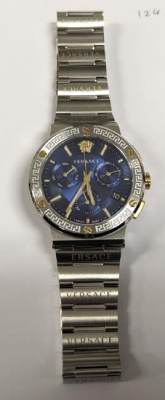Photo of Counterfeit Gucci and Versace Metal Watches