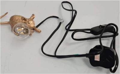 Photo of Lying Mouse Table Lamp sold via Etsy