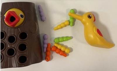 Photo of Magnetic Catch The Worm Woodpecker Game sold via Wish