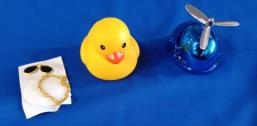 Photo of OUCRIY Rubber Duck Toy with Helmet, Sunglasses and Accessories Chain sold via Amazon
