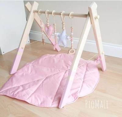 Photo of Wooden Baby Gym Frame and Hanging Toys Set with Leaf Play Mat sold via Etsy